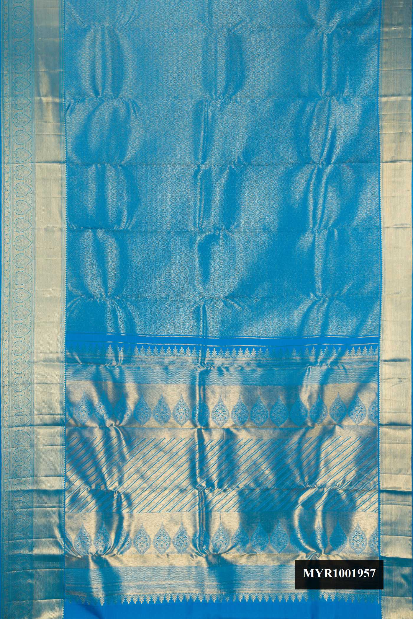 Blue Dual Tone Kanchipuram Silk Saree with Zari Brocade on the body and Zari Border.  displayed on a mannequin