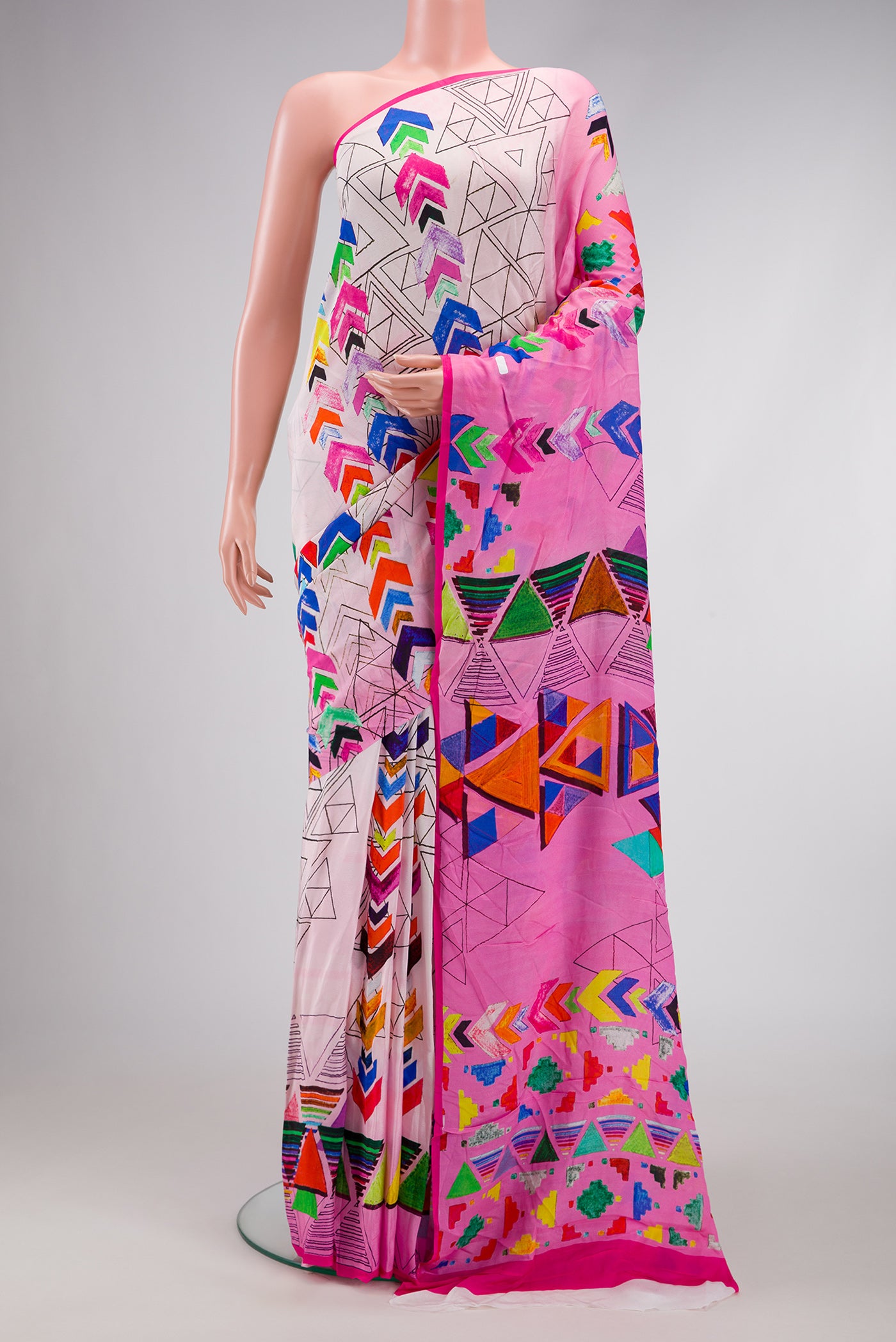 Rose pink Dual Tone Mysore Crepe Saree with Printed design on the body and Printed Border.  displayed on a mannequin
