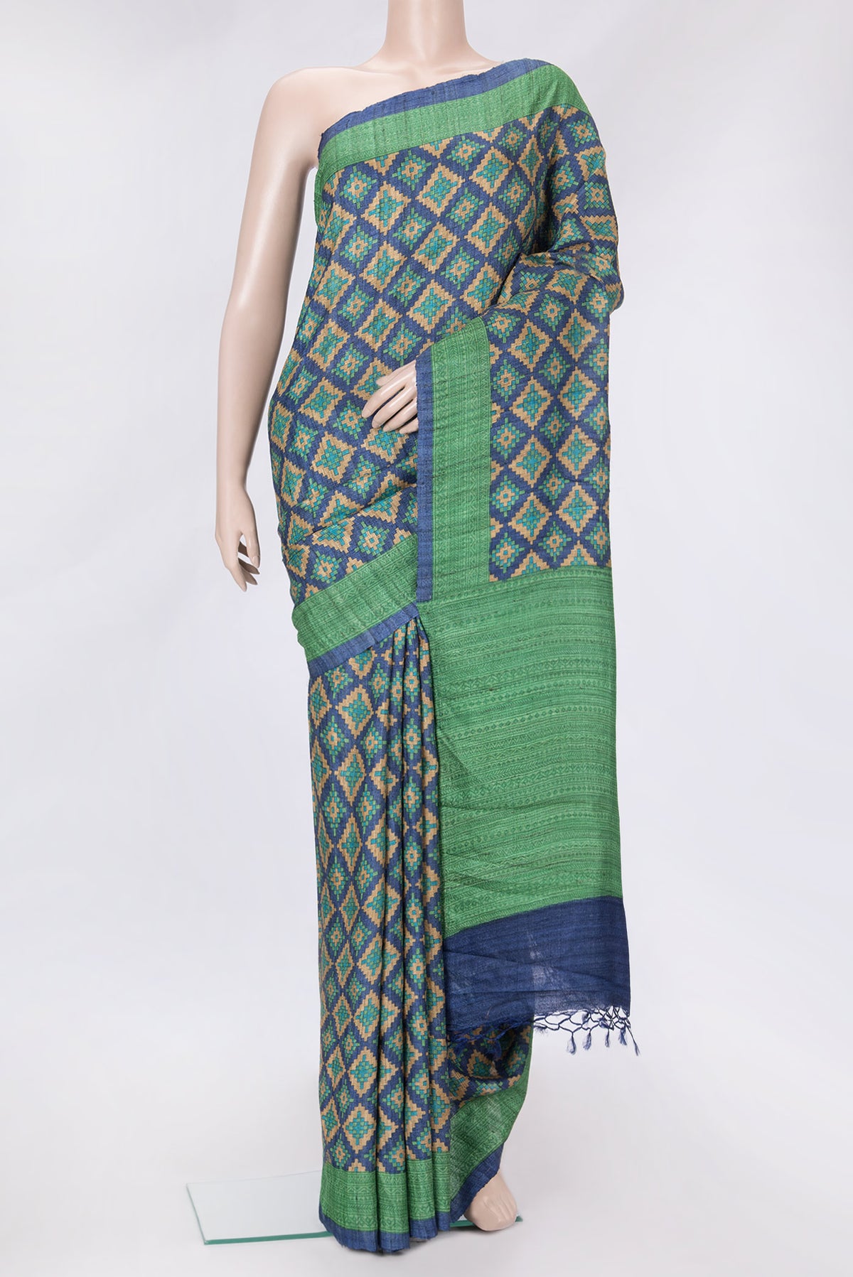 Navy Blue Dual Tone Tussar Silk Saree with Printed design on the body and Printed Border.  displayed on a mannequin