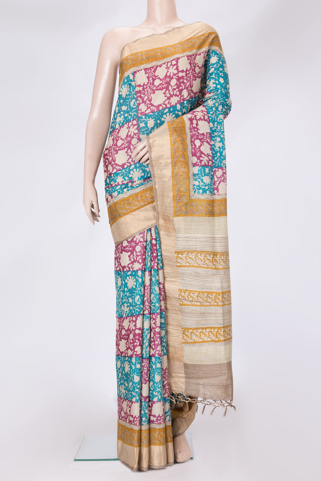 Pink and Sky Blue Color Tussar Silk Saree with Printed design on the body and Zari Border.  displayed on a mannequin