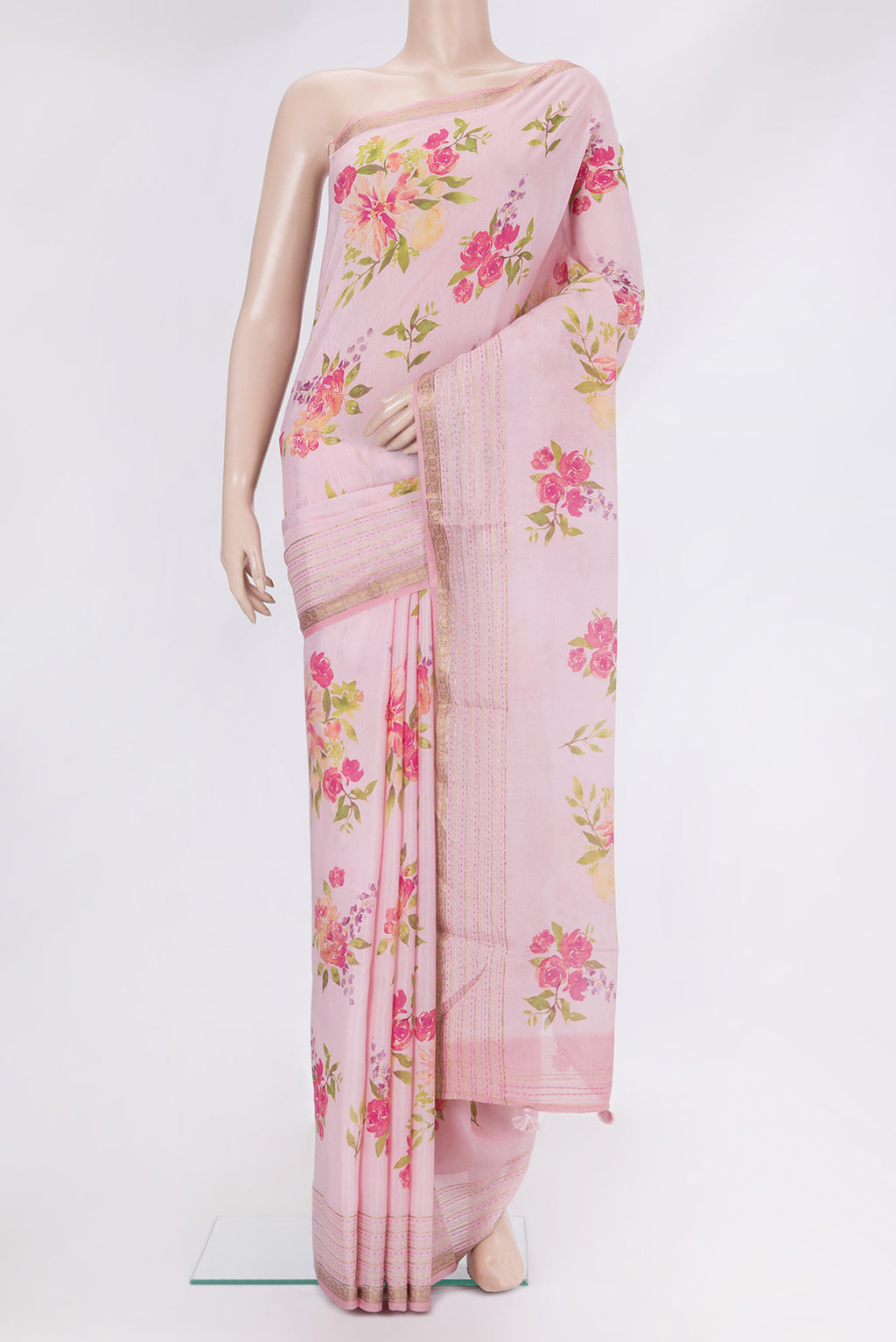 Rose pink Tussar Silk Saree with Floral Print on the body and Embroidery Border.  displayed on a mannequin