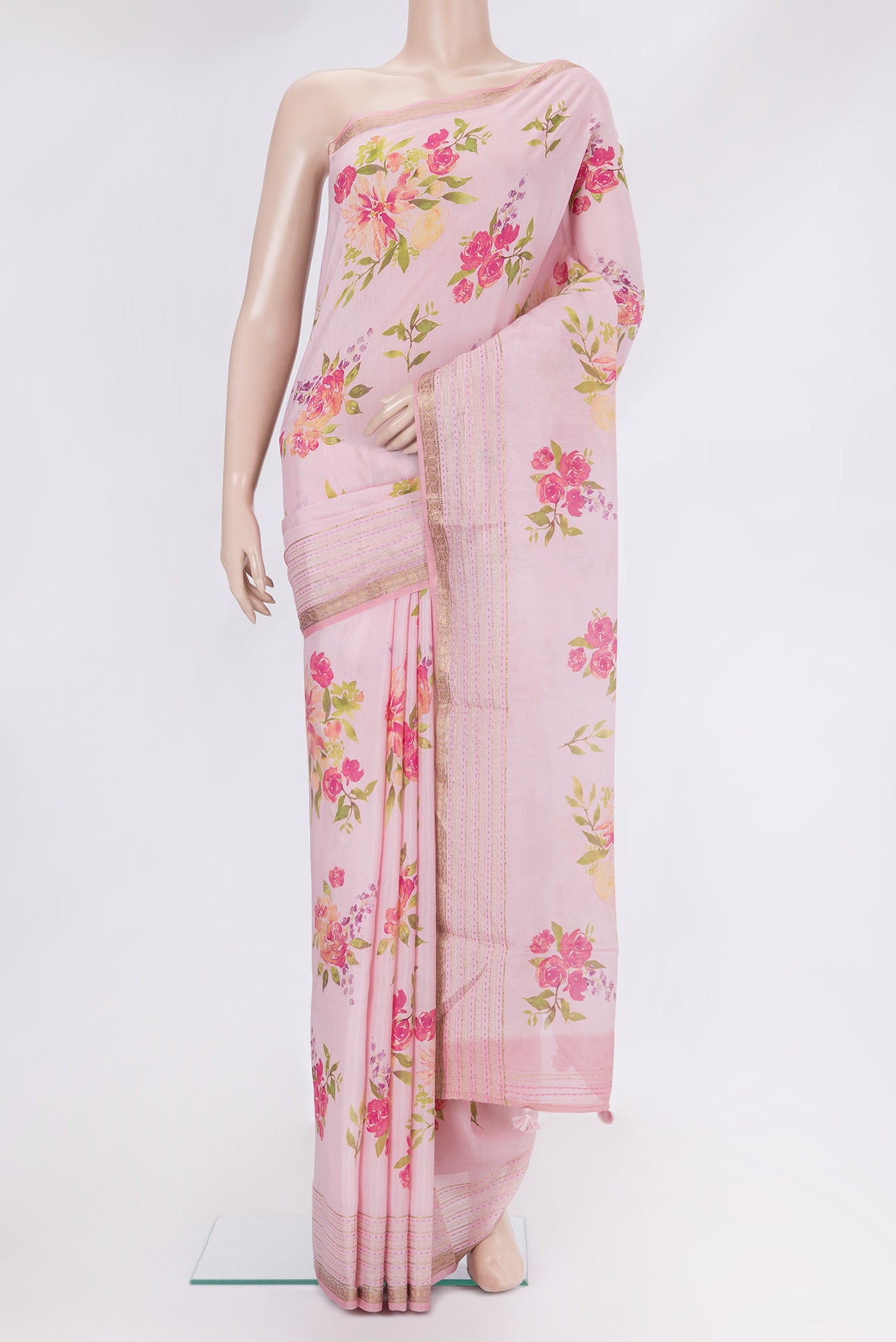 Rose pink Tussar Silk Saree with Floral Print on the body and Embroidery Border.  displayed on a mannequin