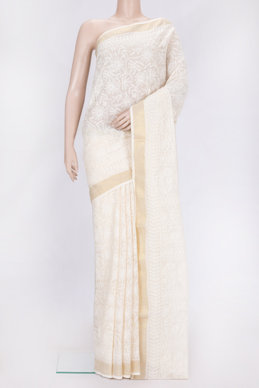 Beige Dual Tone Kota Silk Saree with Embroidery on the body and Zari Border.  displayed on a mannequin