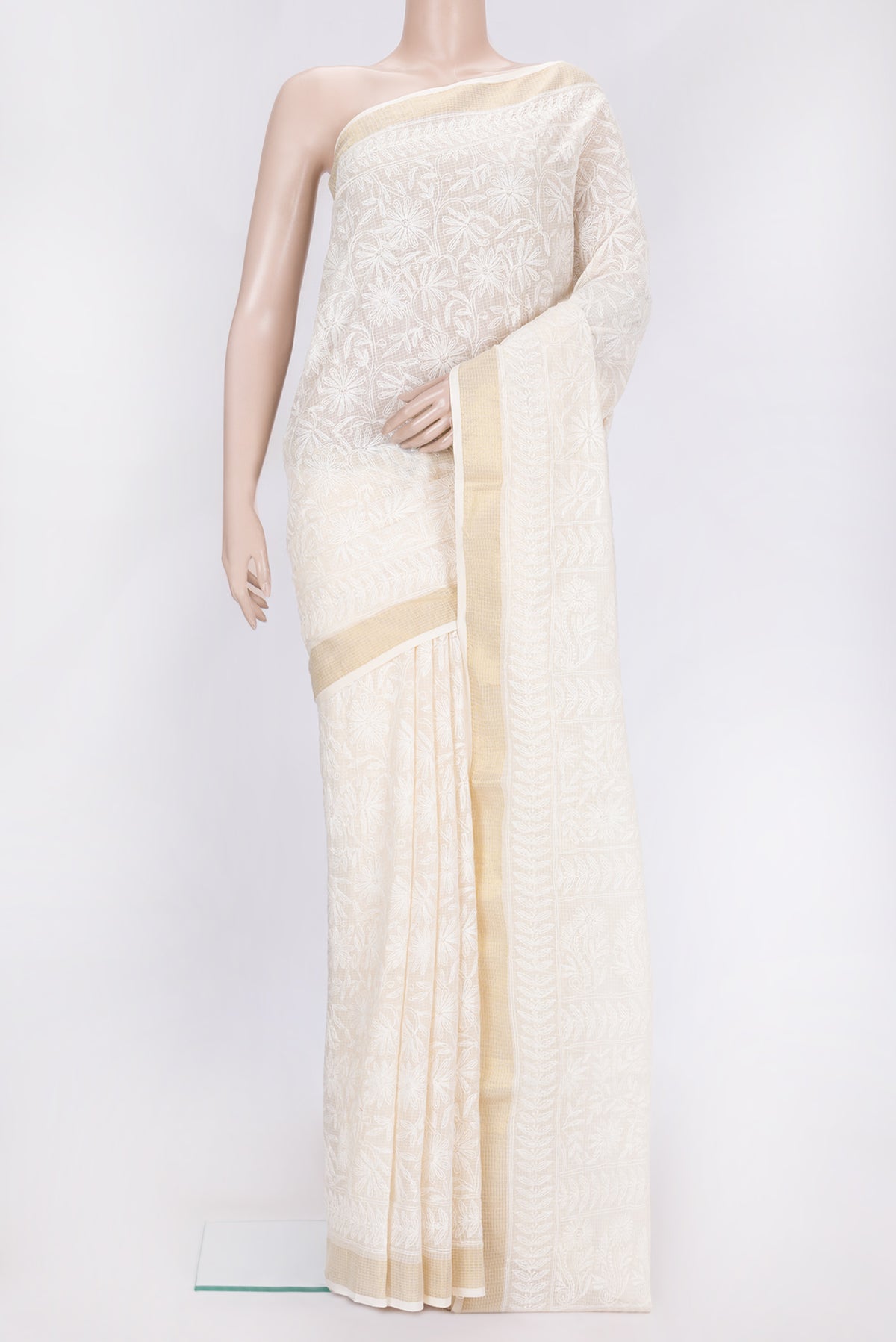 Beige Dual Tone Kota Silk Saree with Embroidery on the body and Zari Border.  displayed on a mannequin