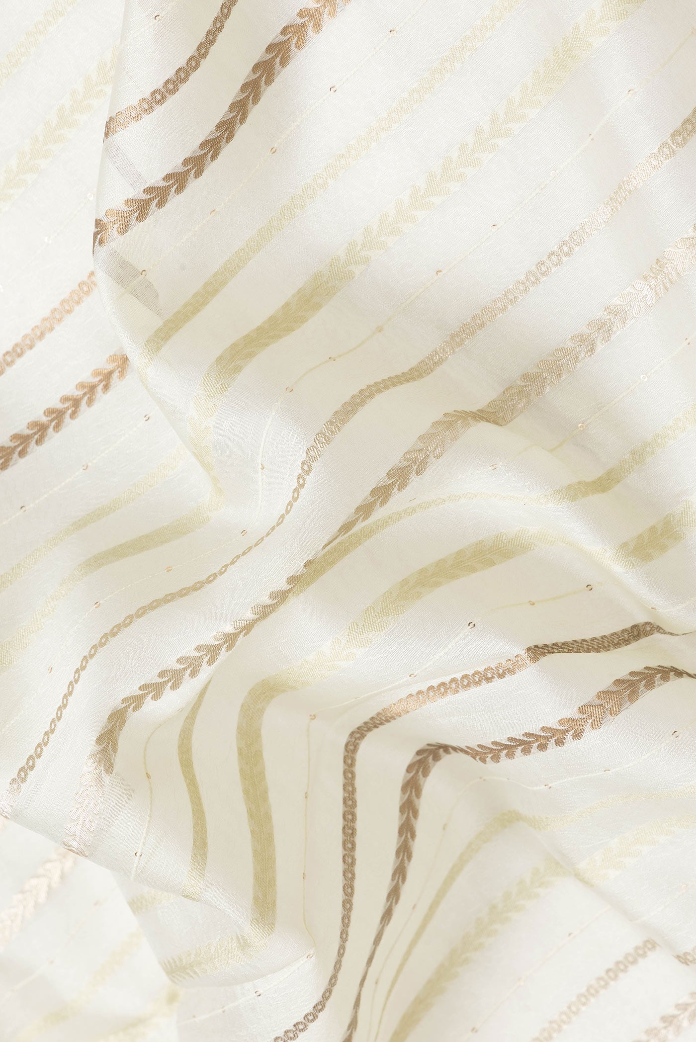 Close up of Pista Green Dual Tone Organza Silk Saree with Stripes on the body and Fancy Border.  displaying folds