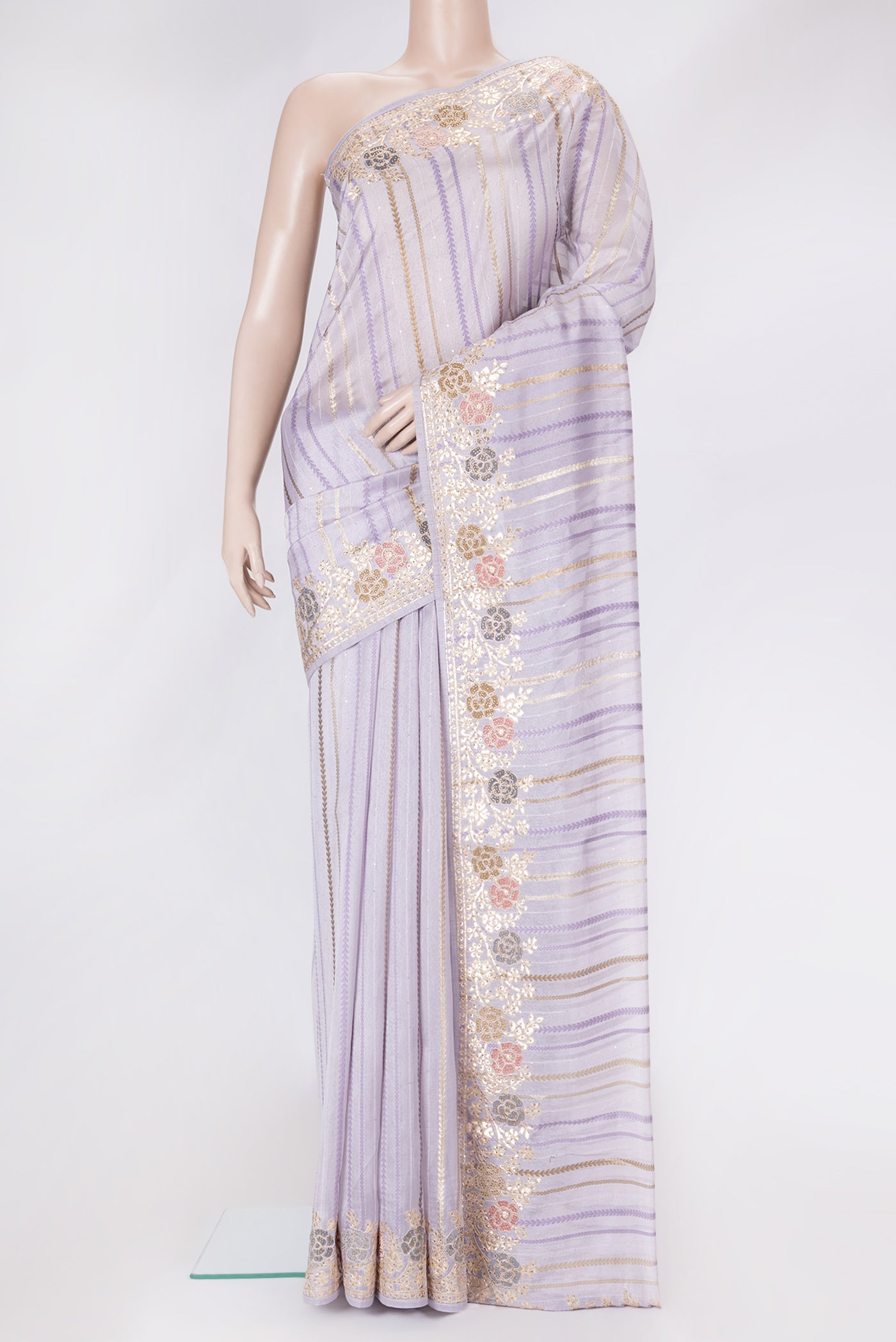 Lavender Dual Tone Organza Silk Saree with Stripes on the body and Fancy Border.  displayed on a mannequin
