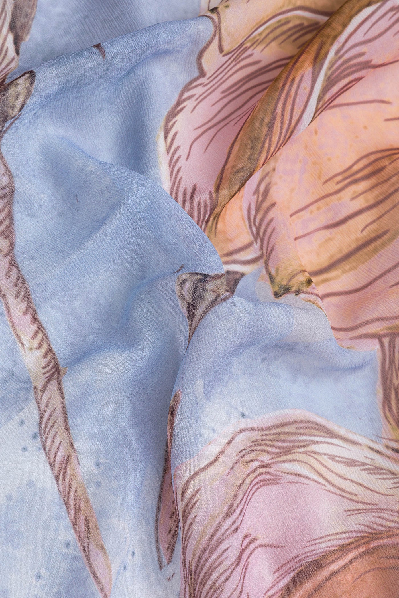 Close up of Grey Dual Tone Mysore Chiffon Saree with Printed design on the body and Zari Border.  displaying folds
