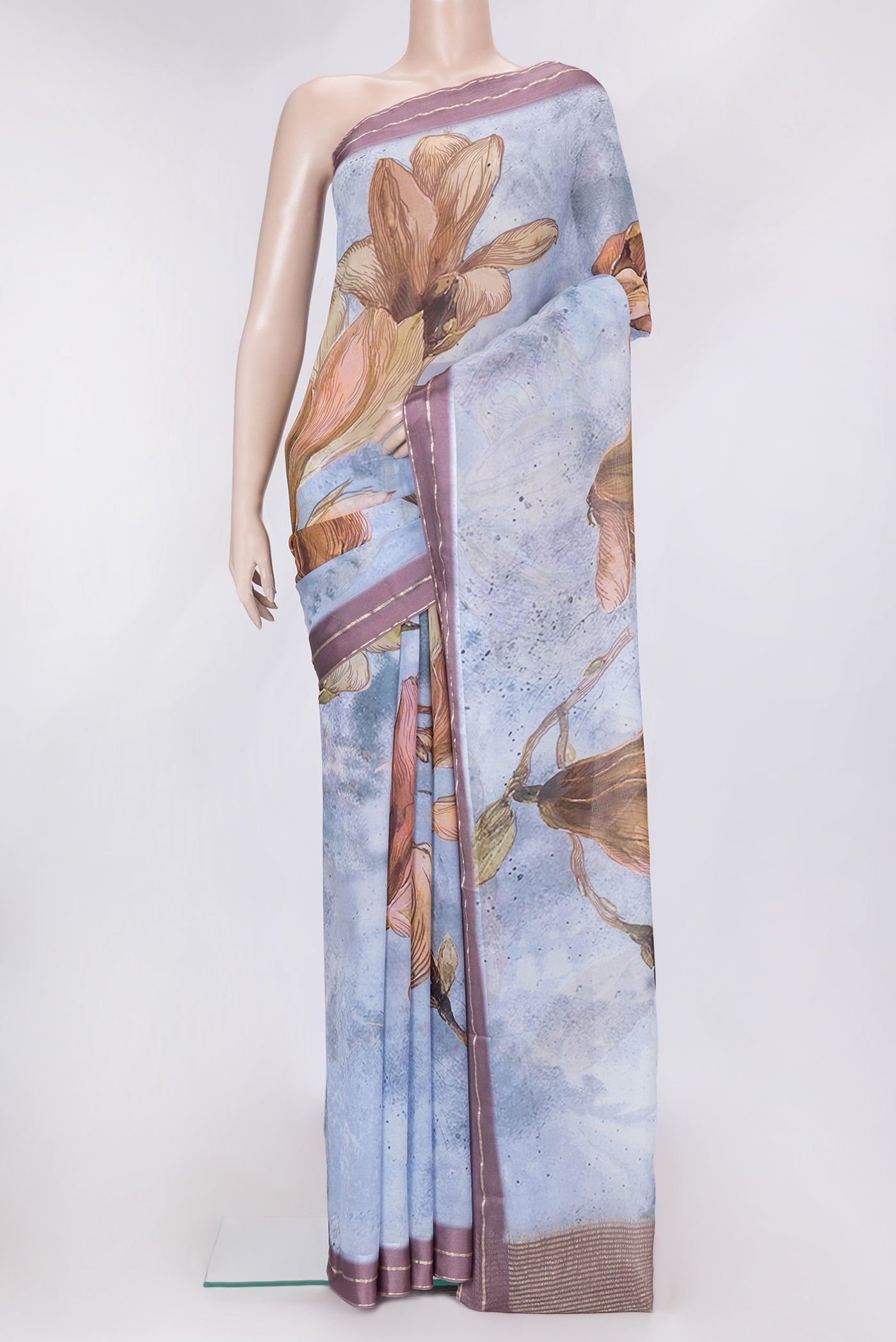 Grey Dual Tone Mysore Chiffon Saree with Printed design on the body and Zari Border.  displayed on a mannequin