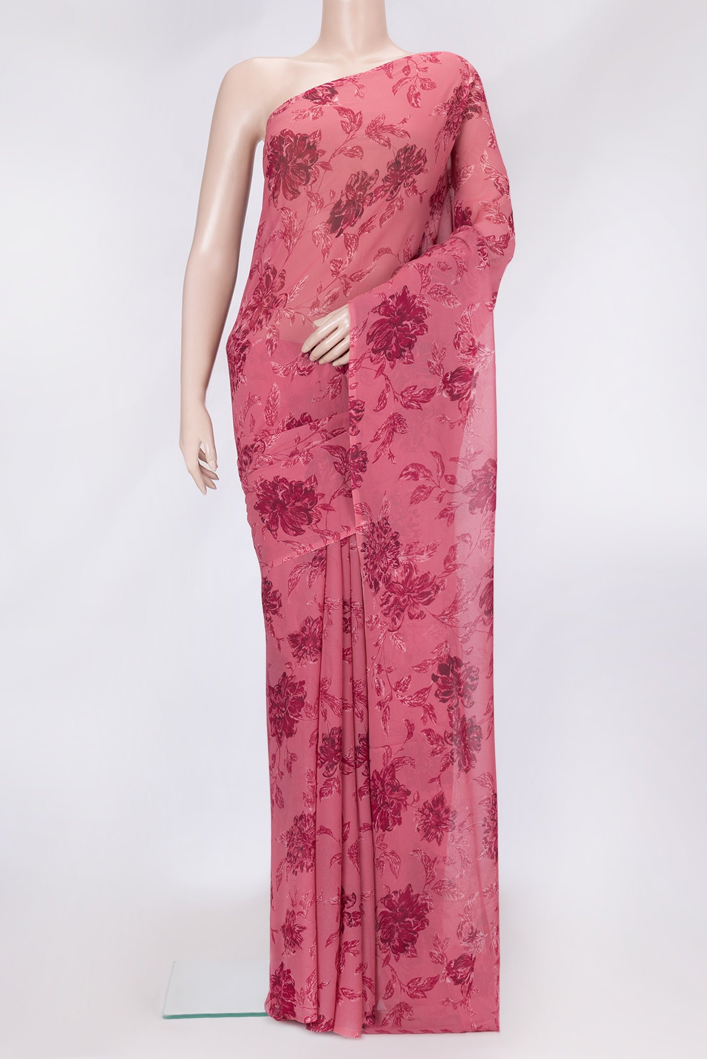 Pink Dual Tone Mysore Georgette Saree with Printed design on the body and Without Border.  displayed on a mannequin