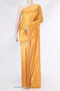 Gold Dual Tone Mysore Crepe Saree with Embroidery on the body and Embroidery Border.  displayed on a mannequin