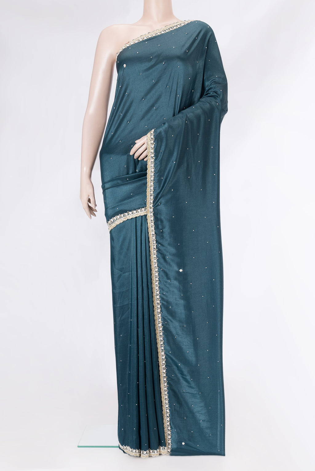 Peacock Blue Dual Tone Mysore Crepe Saree with Embroidery on the body and Embroidery Border.  displayed on a mannequin