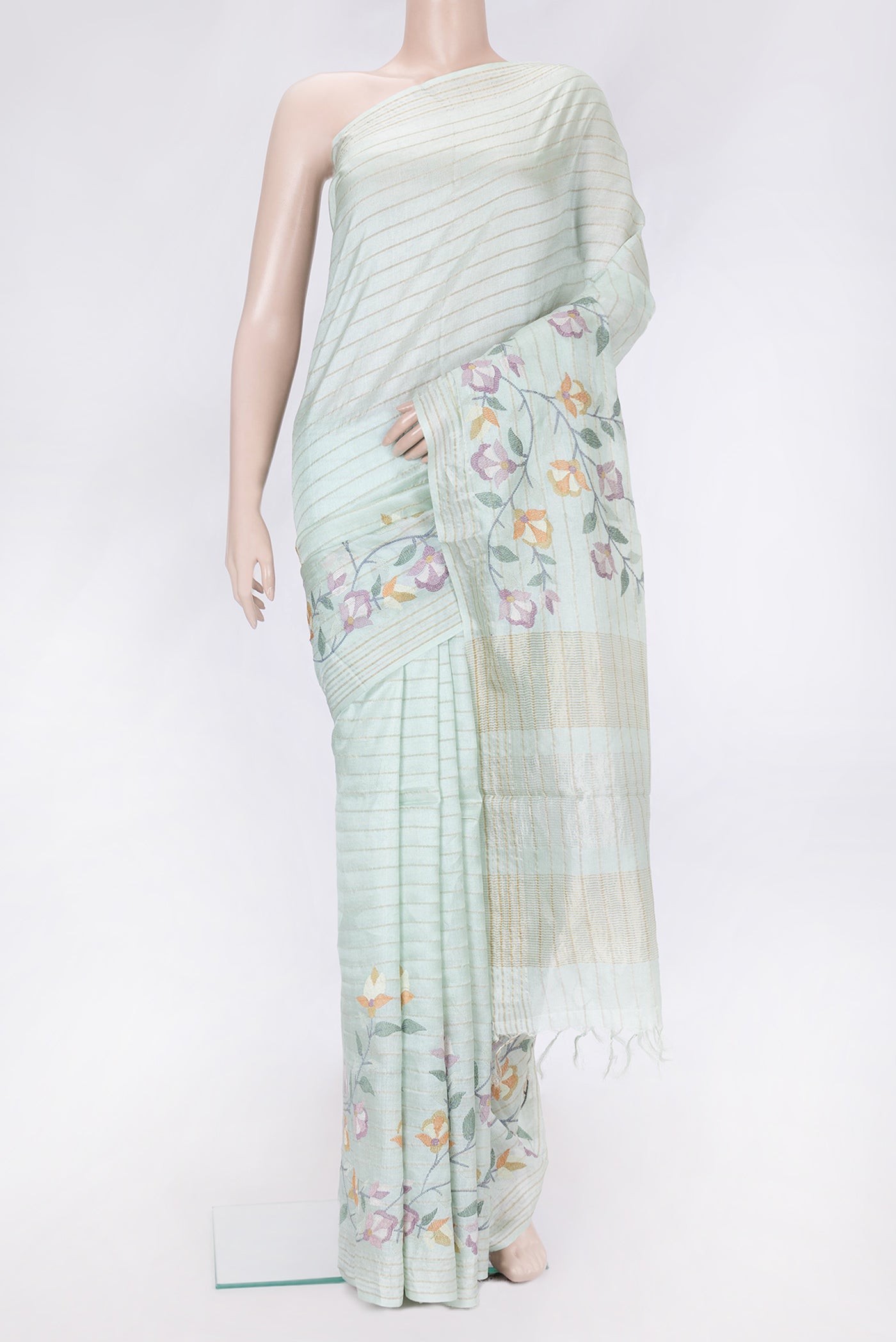 Sea Green Dual Tone Tussar Silk Saree with Stripes on the body and Embroidery Border.  displayed on a mannequin