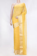 Yellow Dual Tone Kota Silk Saree with Checked design on the body and Zari Border displayed on a mannequin