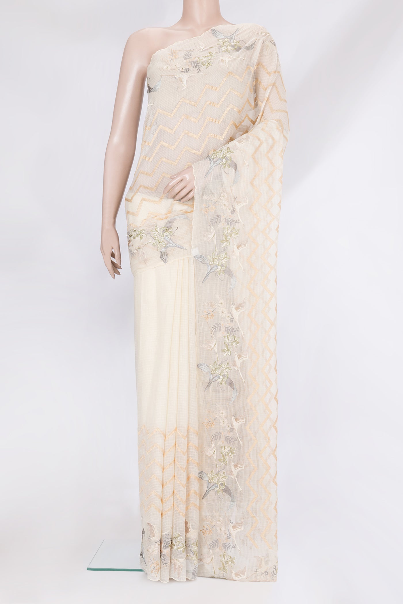 Off White Kota Silk Saree with Embroidery on the body and Embroidery Border.  displayed on a mannequin