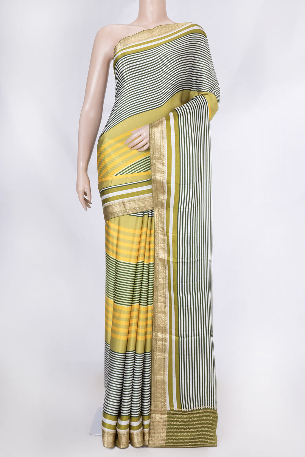 Green Satin Silk Saree with Geometric Print on the body and Zari Border displayed on a mannequin
