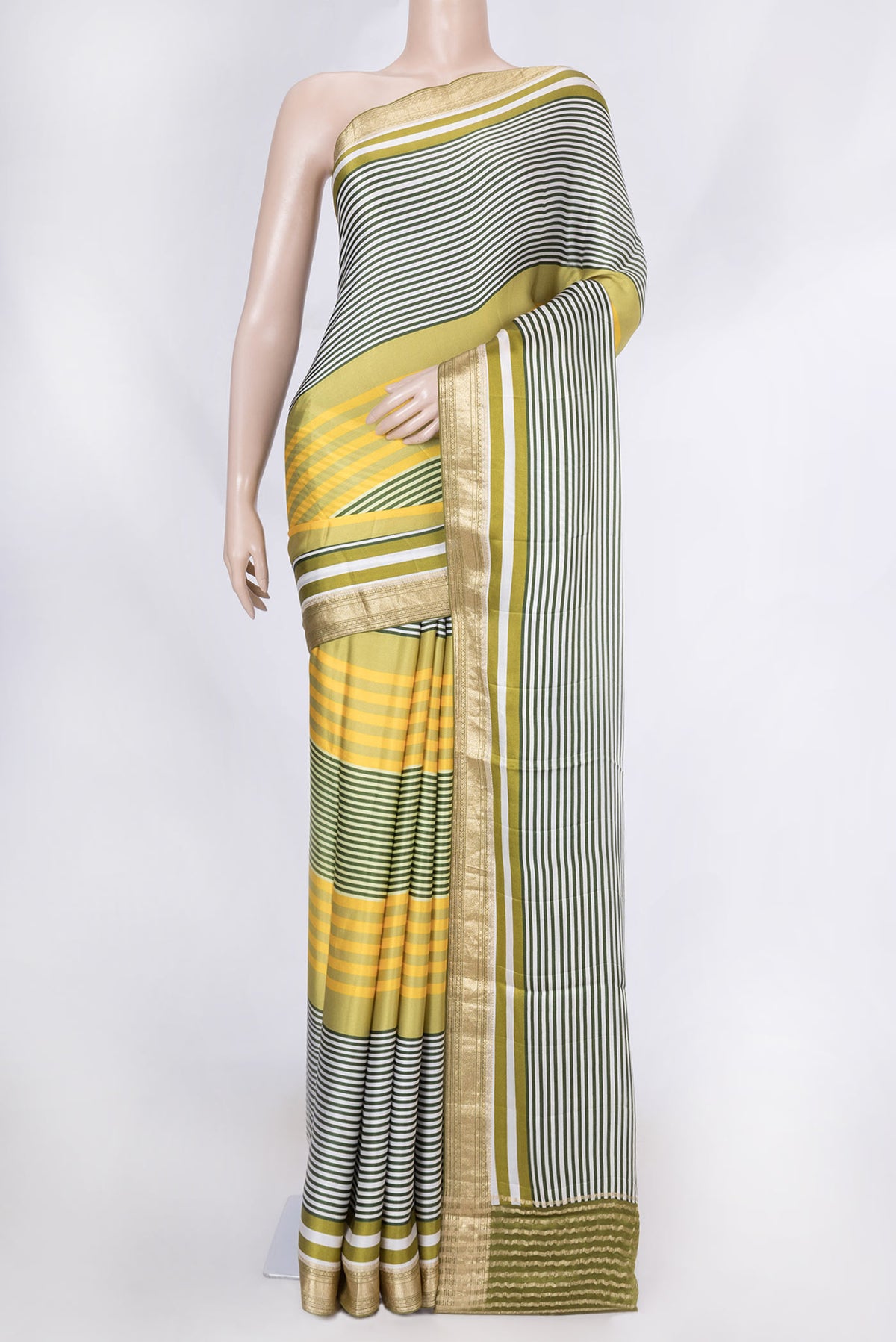 Green Satin Silk Saree with Geometric Print on the body and Zari Border displayed on a mannequin