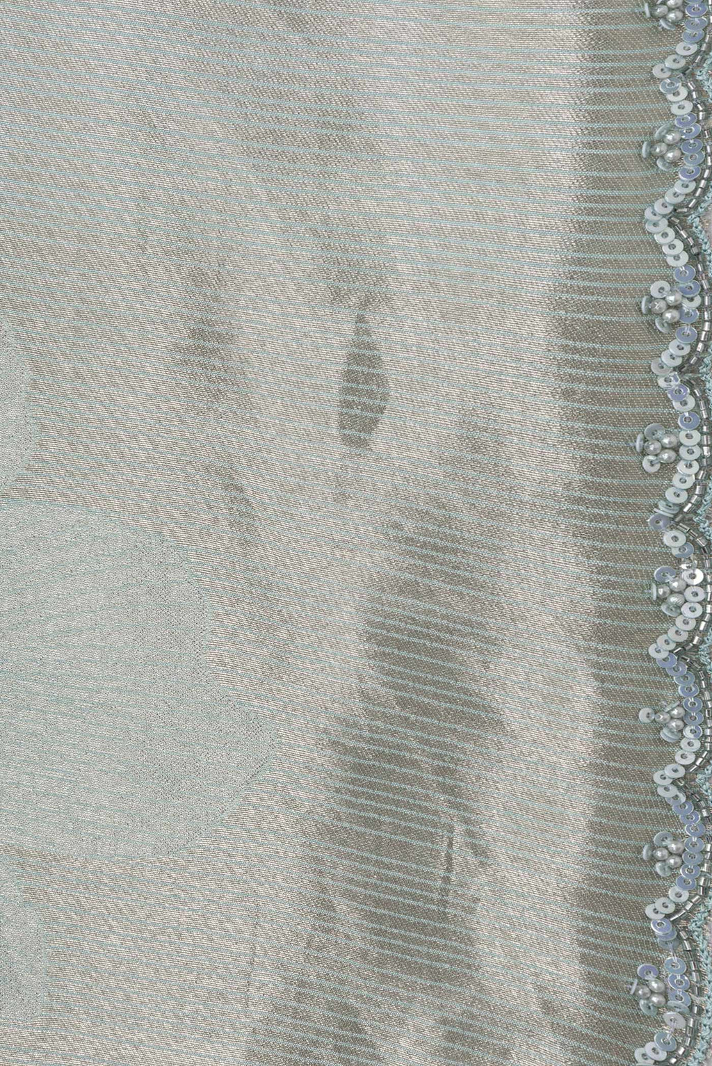 Border image of Sea Green Dual Tone Mysore Georgette Saree with Embroidery on the body and Embroidery Border. 