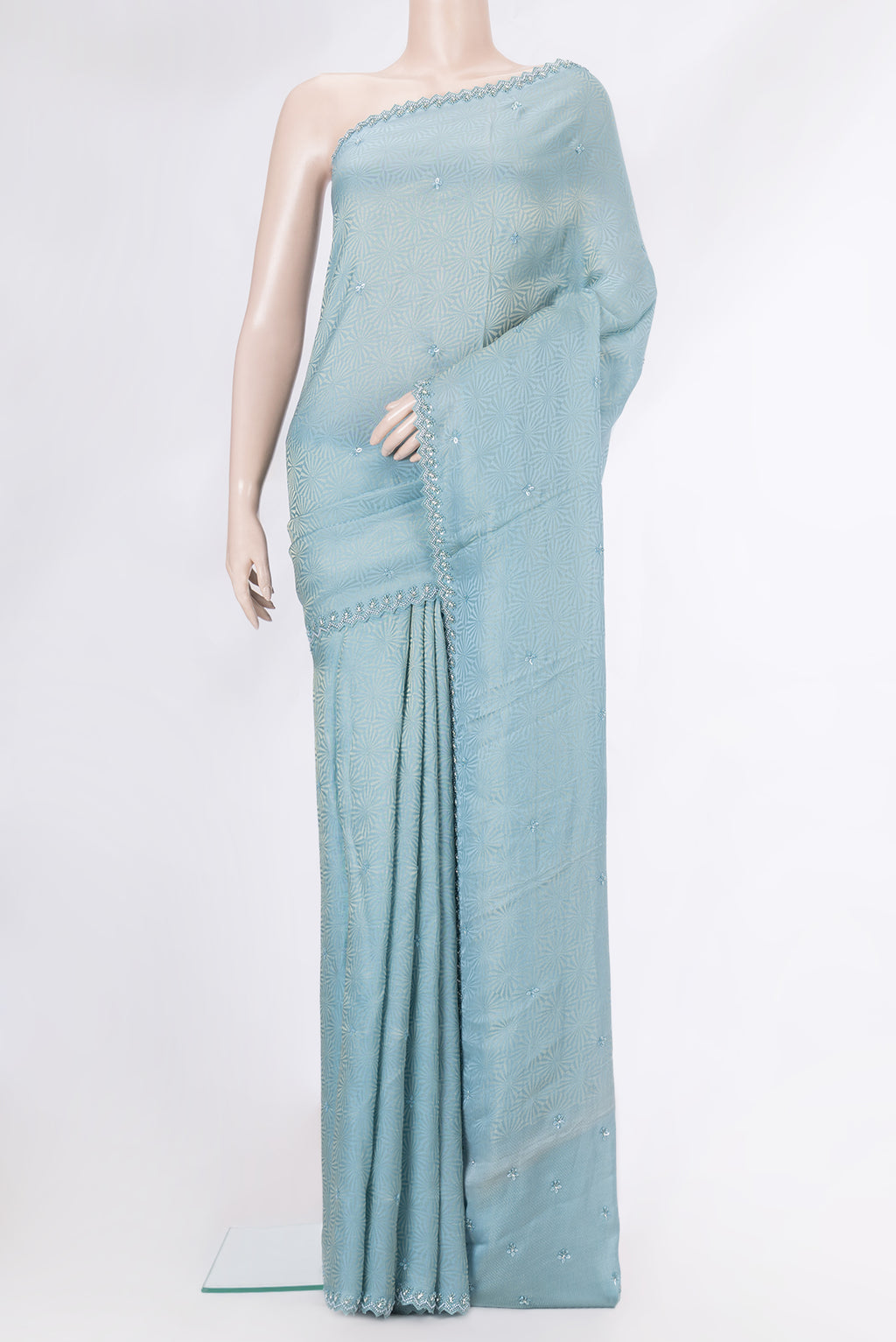Blue Dual Tone Georgette Saree with Embroidery on the body and Embroidery Border.  displayed on a mannequin