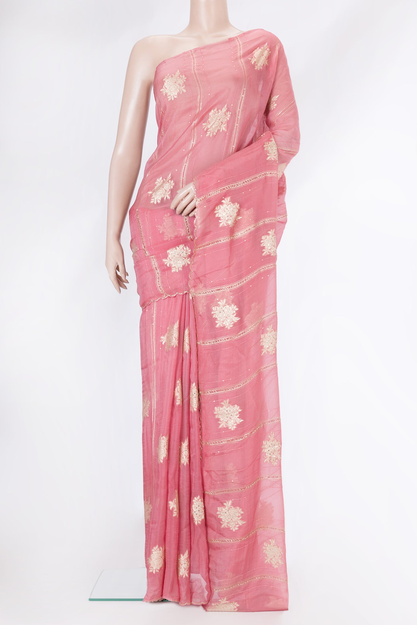 Pink Georgette Saree with Embroidery on the body and Embroidery Border.  displayed on a mannequin