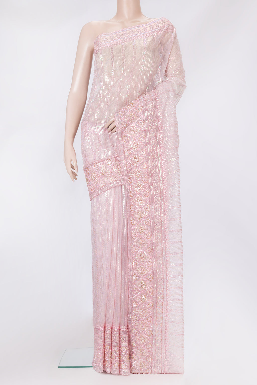 Pink Dual Tone Organza Silk Saree with Embroidery on the body and Embroidery Border.  displayed on a mannequin