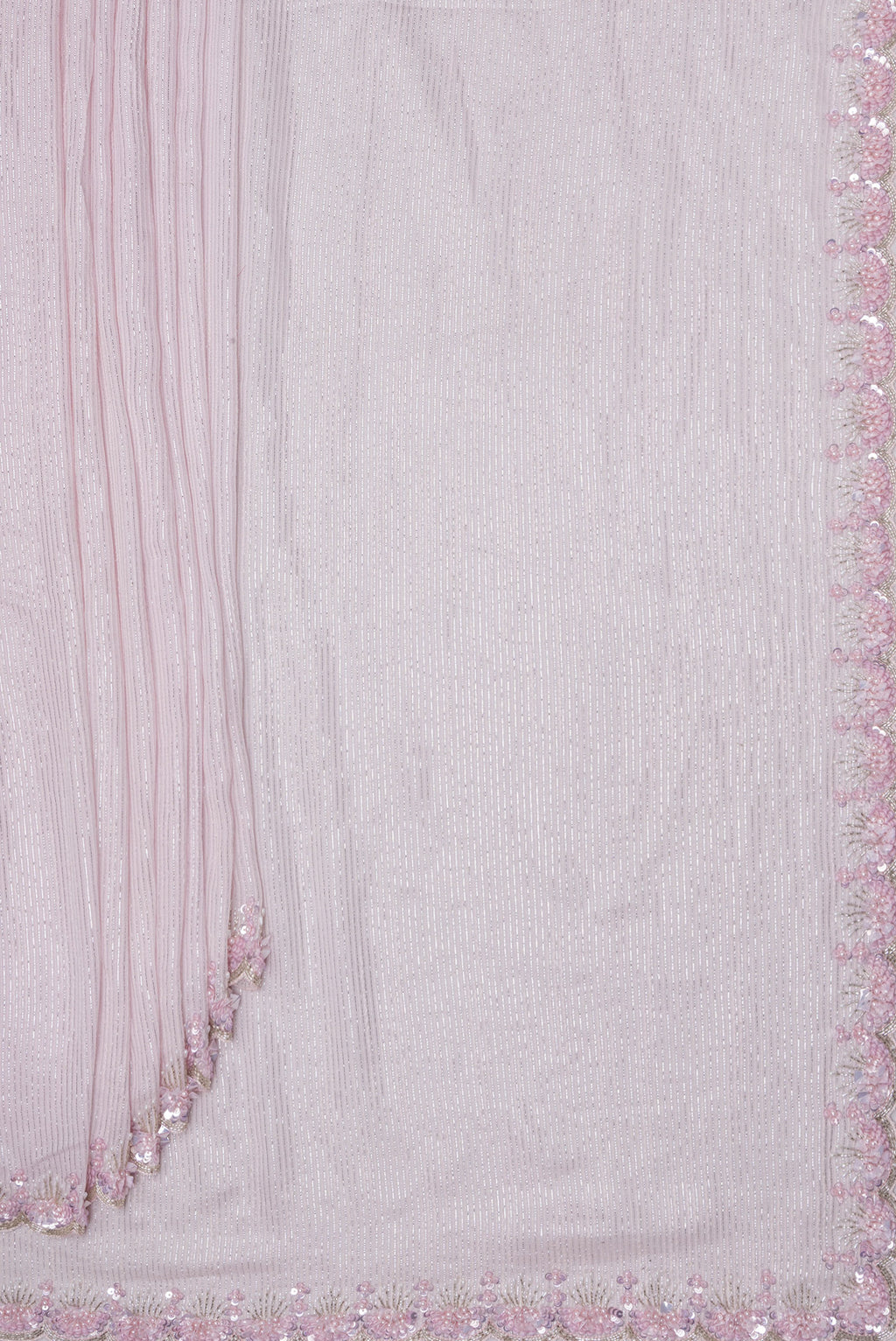 Pleats and pallu of Rose Gold Dual Tone Georgette Saree with Embroidery on the body and Sequin Border. 
