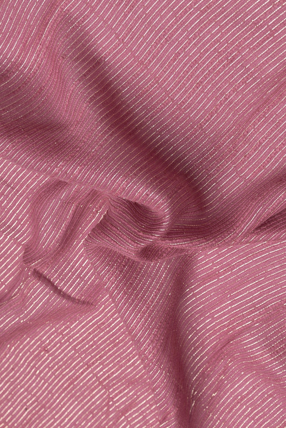 Close up of Pink Dual Tone Georgette Saree with Zari Brocade on the body and Embroidery Border.  displaying folds
