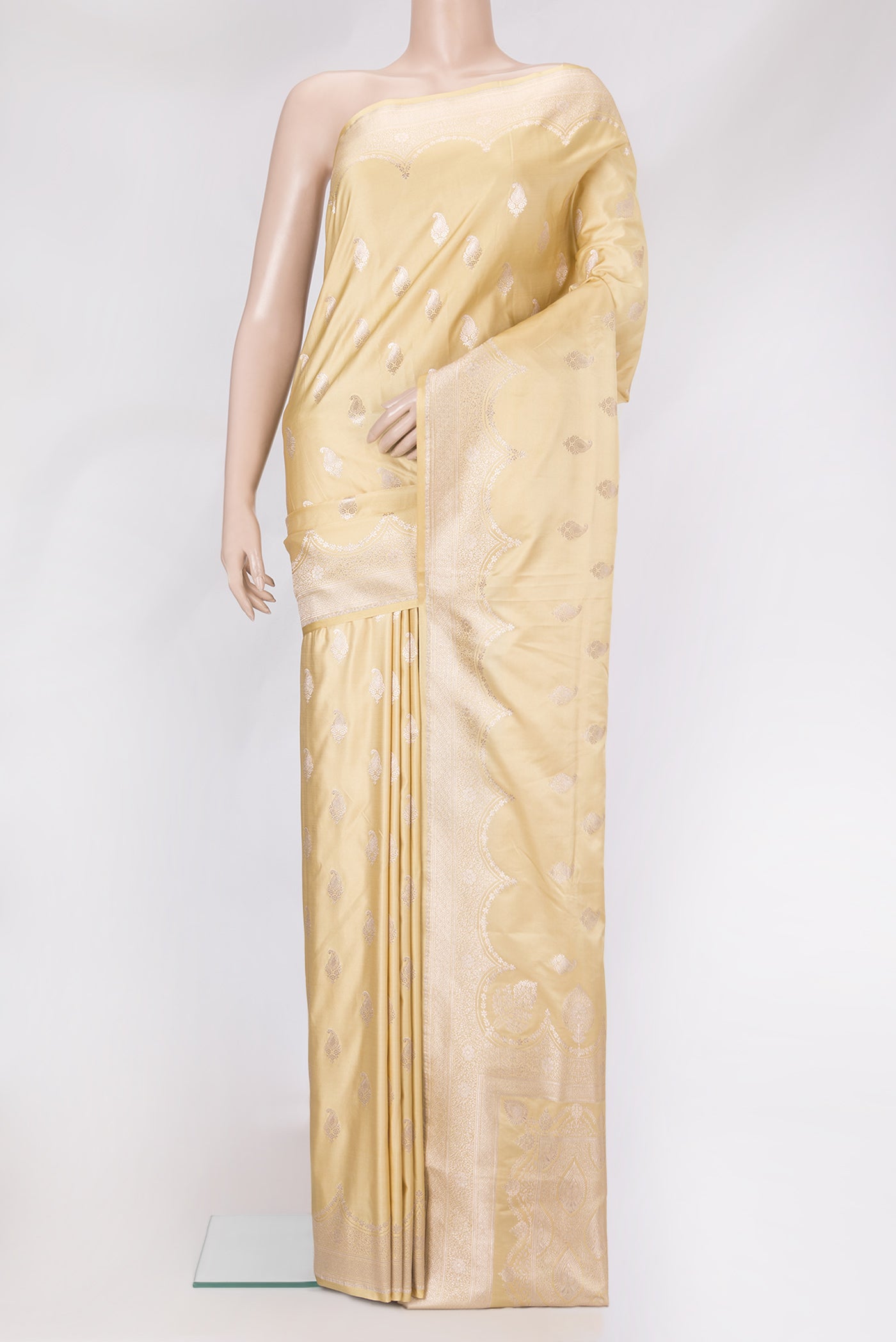 Sandal Blended Banarasi Silk Saree with Zari Butta on the body and Zari Border.  displayed on a mannequin