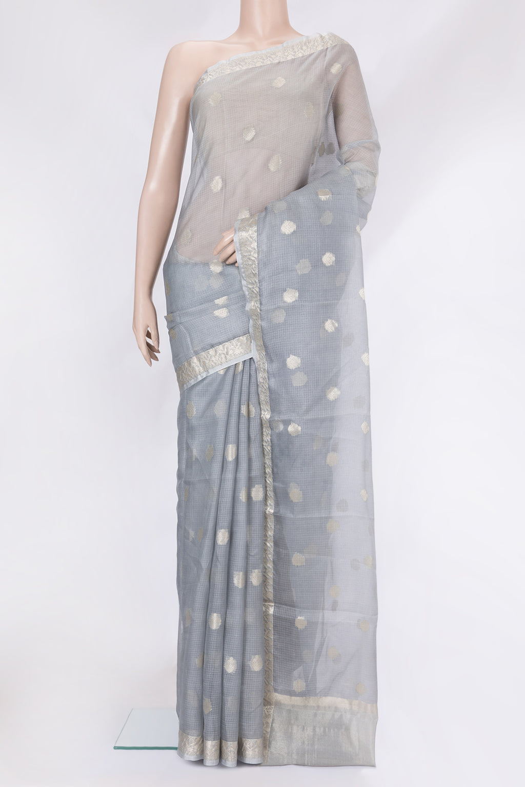 Grey Kota Silk Saree with Zari Butta on the body and Zari Border.  displayed on a mannequin