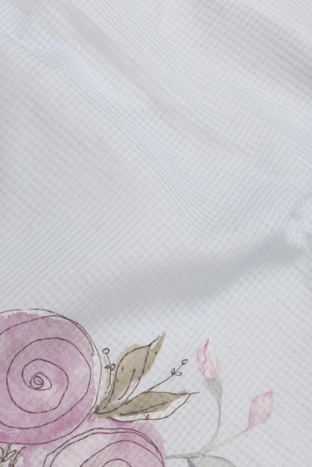 Close up of Sky Blue Dual Tone Kota Silk Saree with Printed design on the body and Zari Border.  displaying folds