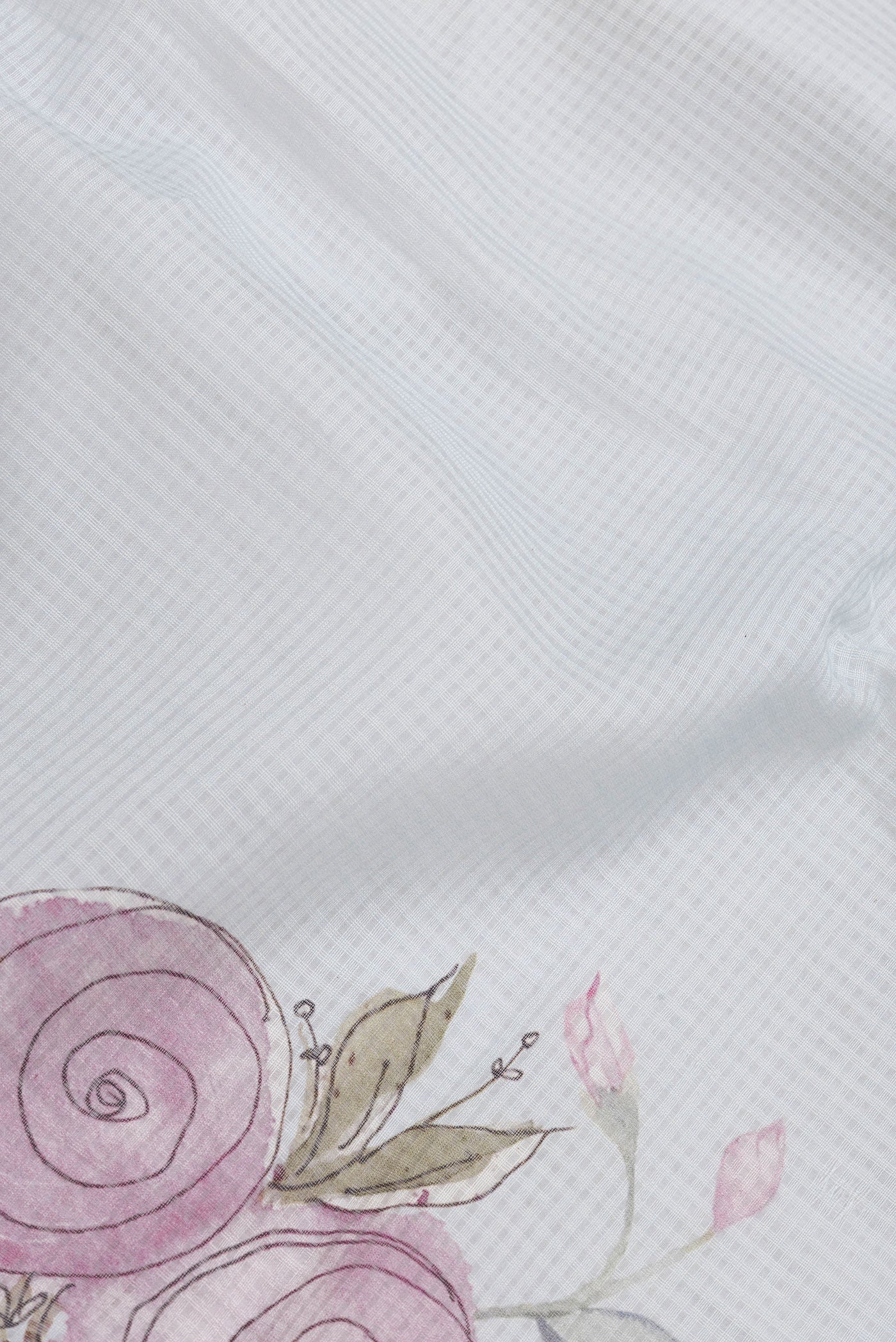 Close up of Sky Blue Dual Tone Kota Silk Saree with Printed design on the body and Zari Border.  displaying folds
