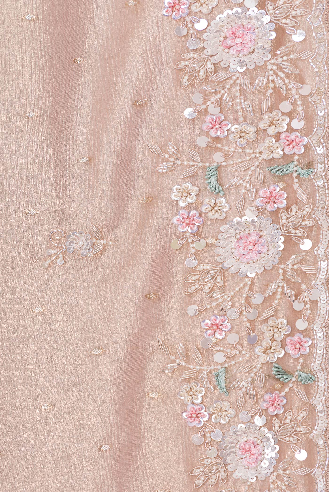 Border image of Rose Gold Dual Tone Organza Silk Saree with Embroidery on the body and Embroidery Border. 