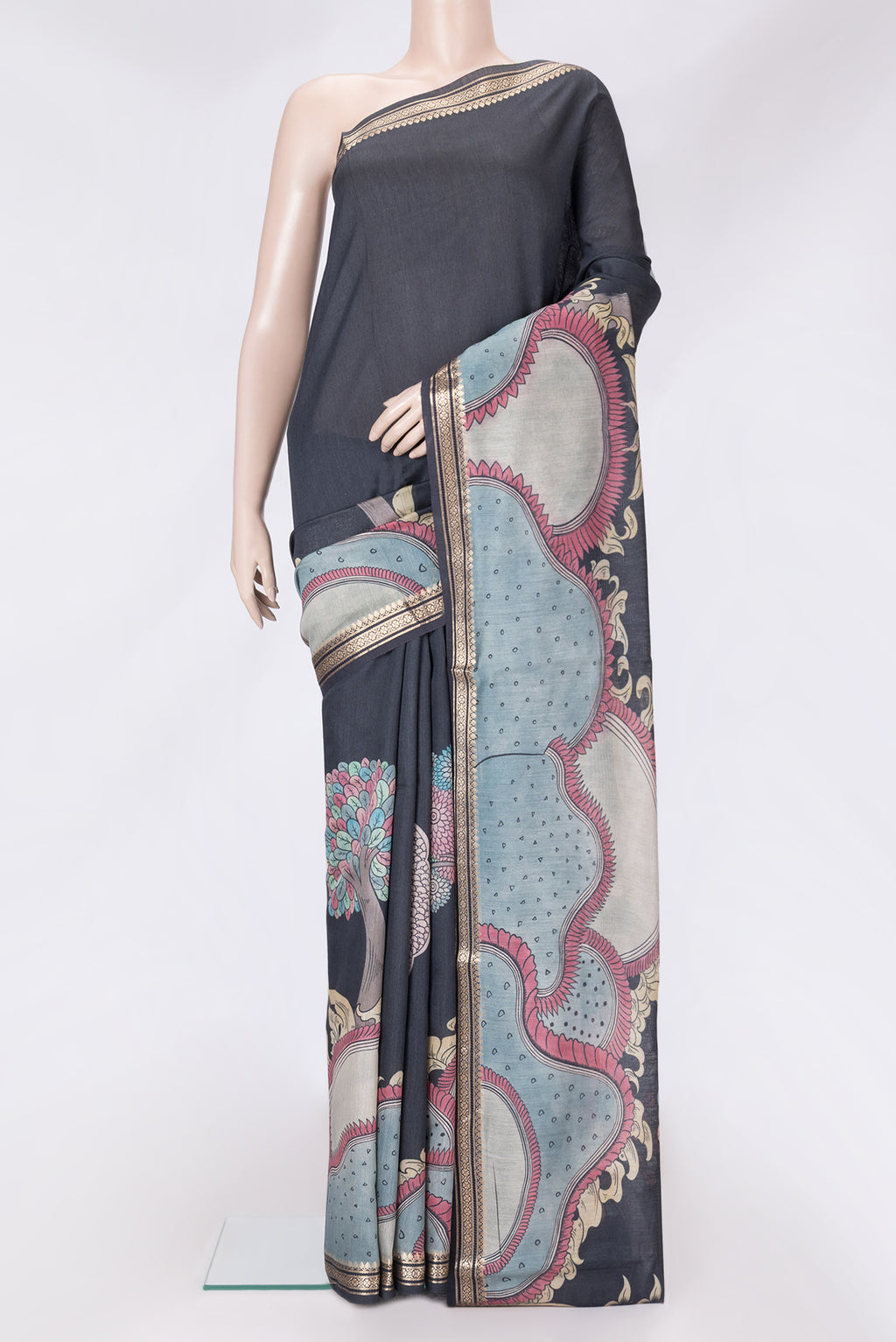 Black Dual Tone Tussar Silk Saree with Printed design on the body and Zari Border.  displayed on a mannequin