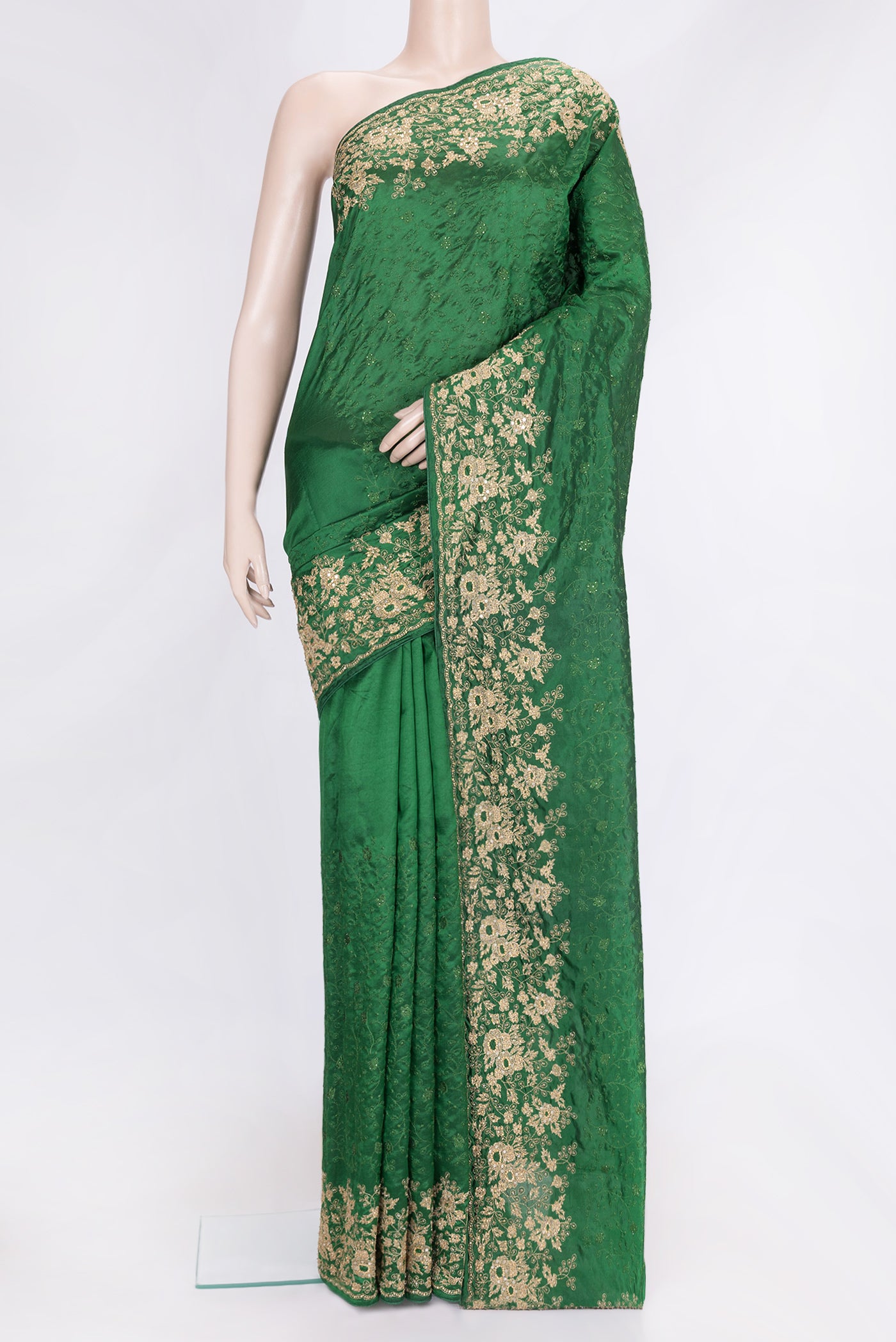 Bottle Green Dual Tone Tussar Silk Saree with Embroidery on the body and Embroidery Border.  displayed on a mannequin