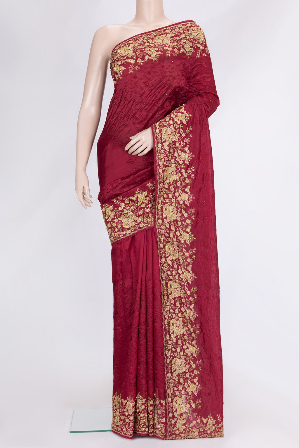Maroon Dual Tone Tussar Silk Saree with Embroidery on the body and Embroidery Border.  displayed on a mannequin