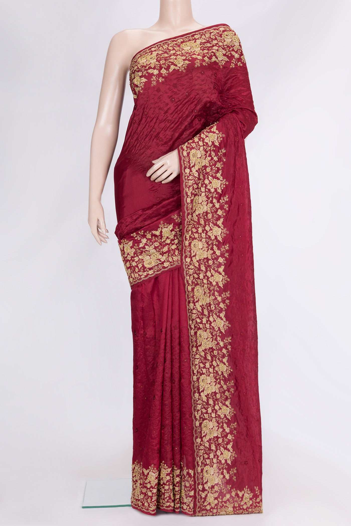 Maroon Dual Tone Tussar Silk Saree with Embroidery on the body and Embroidery Border.  displayed on a mannequin