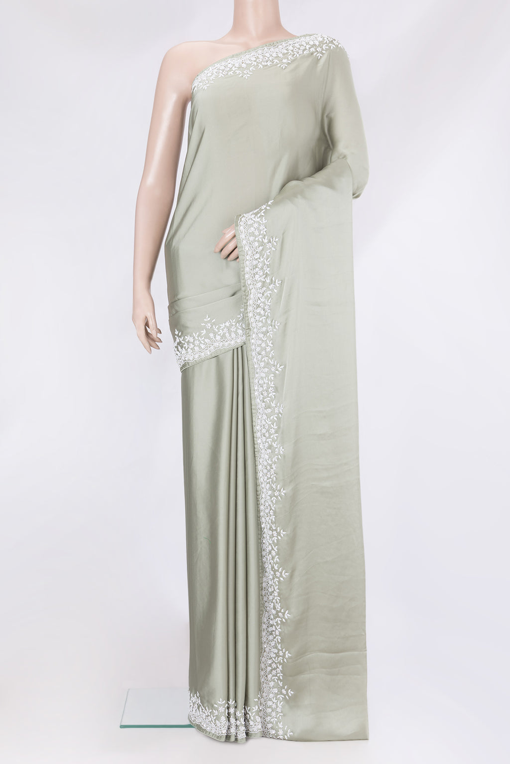 Sage Green Blended Satin Crepe Saree with Plain Body and Sequin Border.  displayed on a mannequin