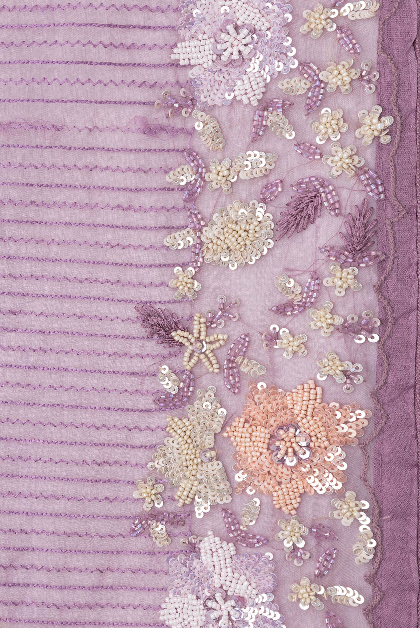 Border image of Pink Dual Tone Organza Silk Saree with Stripes on the body and Embroidery Border. 
