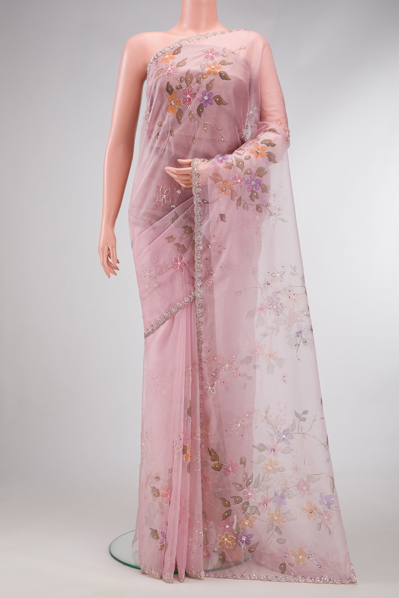 Rose pink Dual Tone Organza Silk Saree with Embroidery on the body and Embroidery Border.  displayed on a mannequin