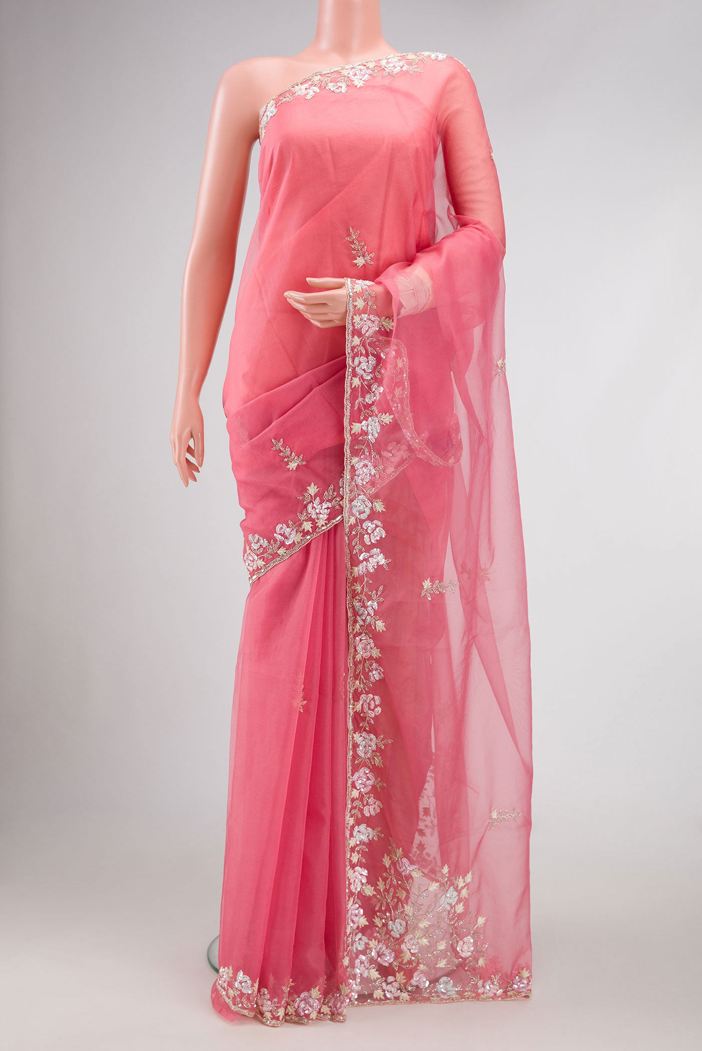 Pink Dual Tone Organza Silk Saree with Embroidery on the body and Embroidery Border.  displayed on a mannequin