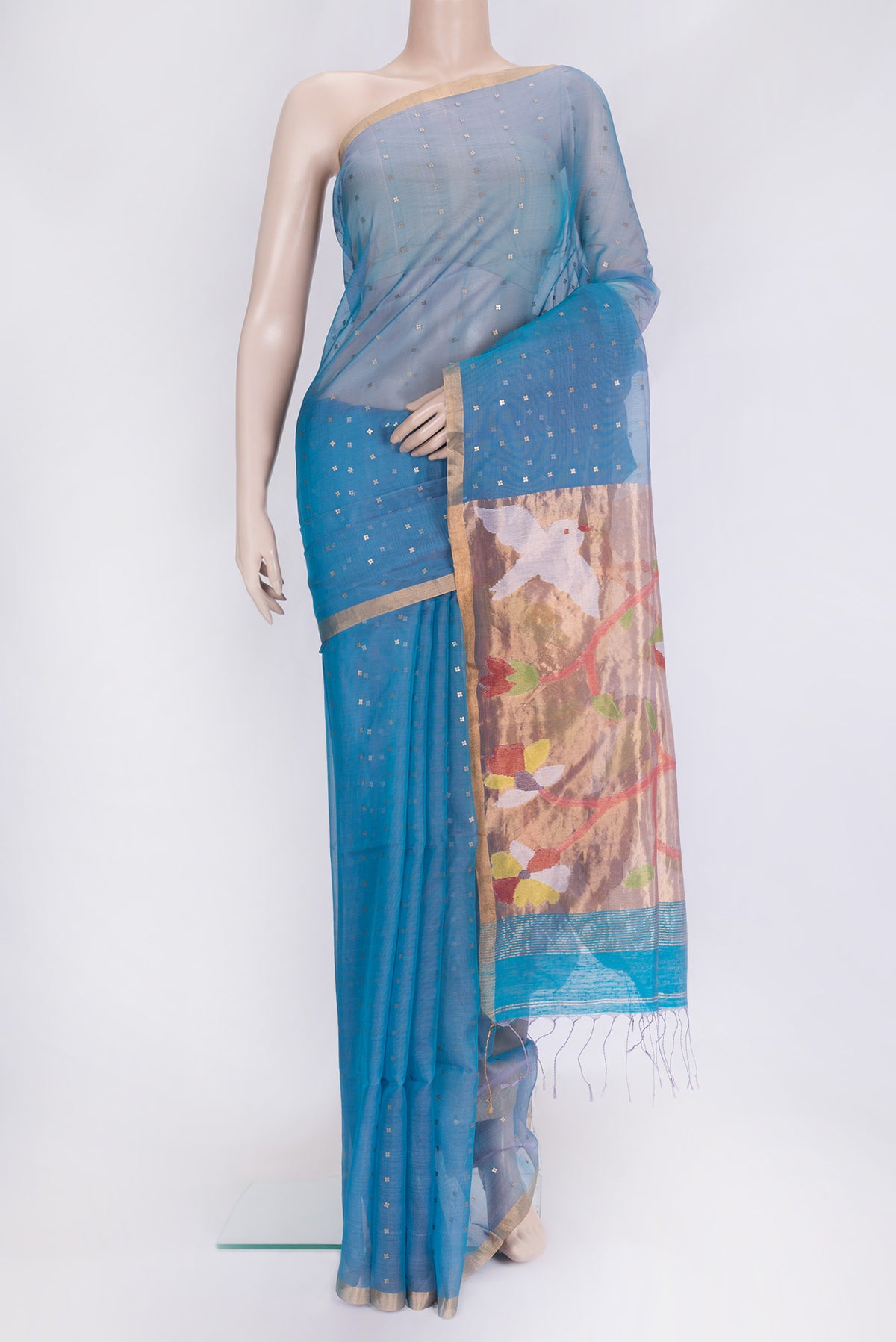 Peacock Blue Dual Tone Tussar Silk Saree with Embroidery on the body and Zari Border.  displayed on a mannequin