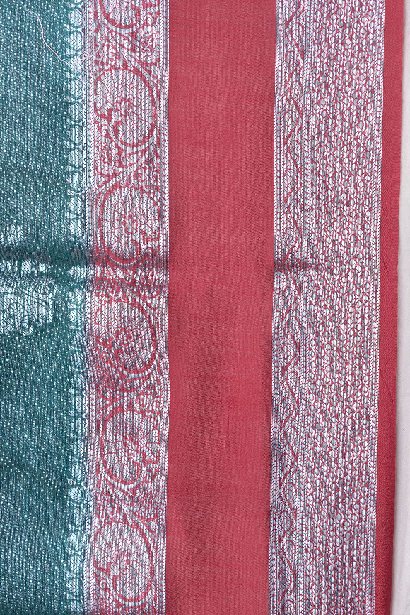 Border image of Peacock Blue Dual Tone Tussar Silk Saree with Zari Brocade on the body and Zari Border. 