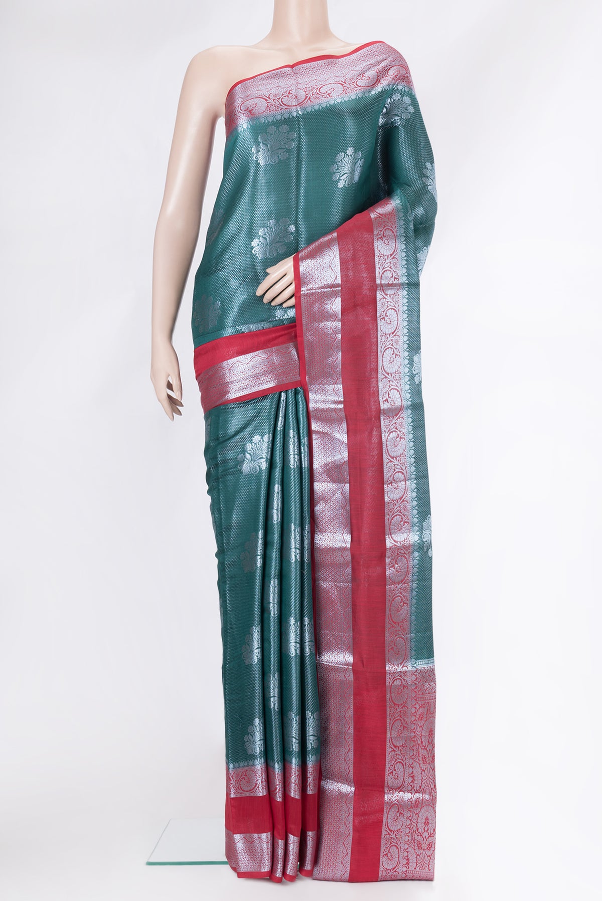 Peacock Blue Dual Tone Tussar Silk Saree with Zari Brocade on the body and Zari Border.  displayed on a mannequin