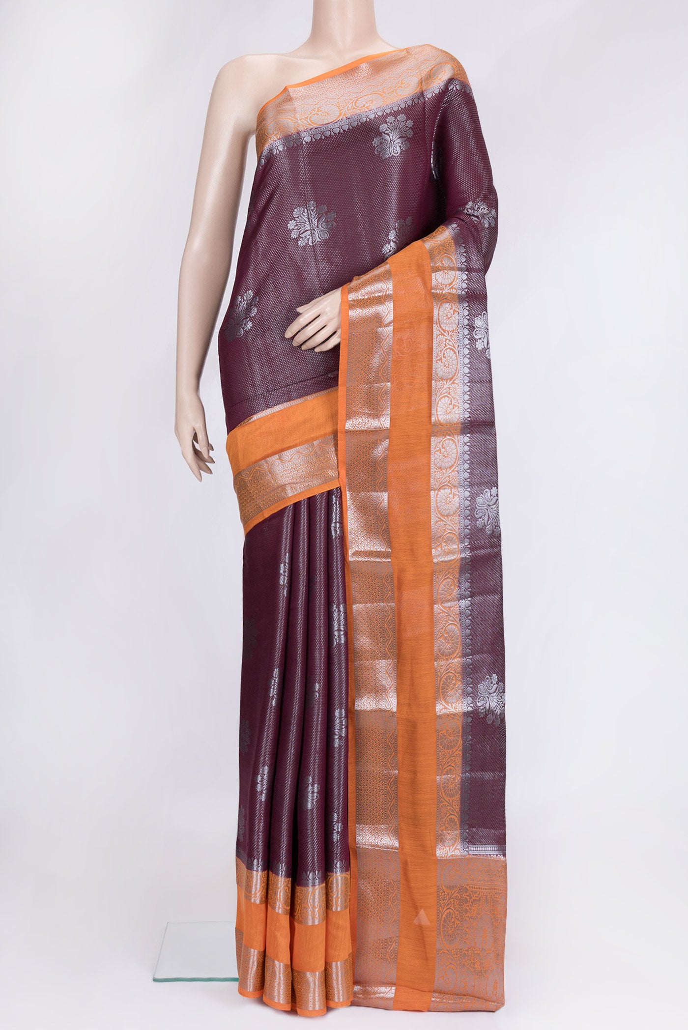 Maroon Dual Tone Tussar Silk Saree with Zari Brocade on the body and Zari Border.  displayed on a mannequin