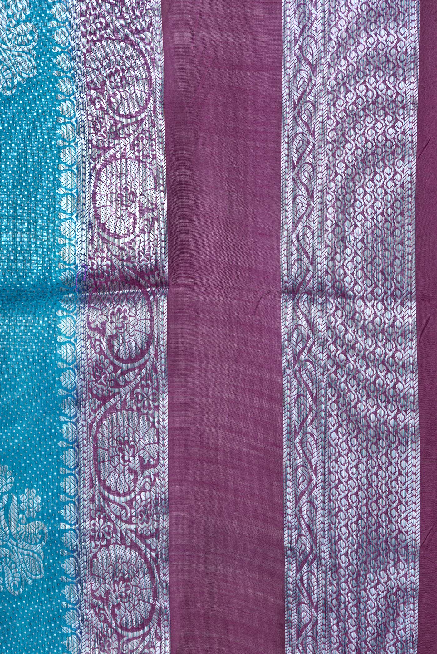 Border image of Sky Blue Dual Tone Tussar Silk Saree with Zari Brocade on the body and Zari Border. 