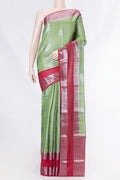 Green Dual Tone Tussar Saree with Zari Brocade on the body and Zari Border displayed on a mannequin