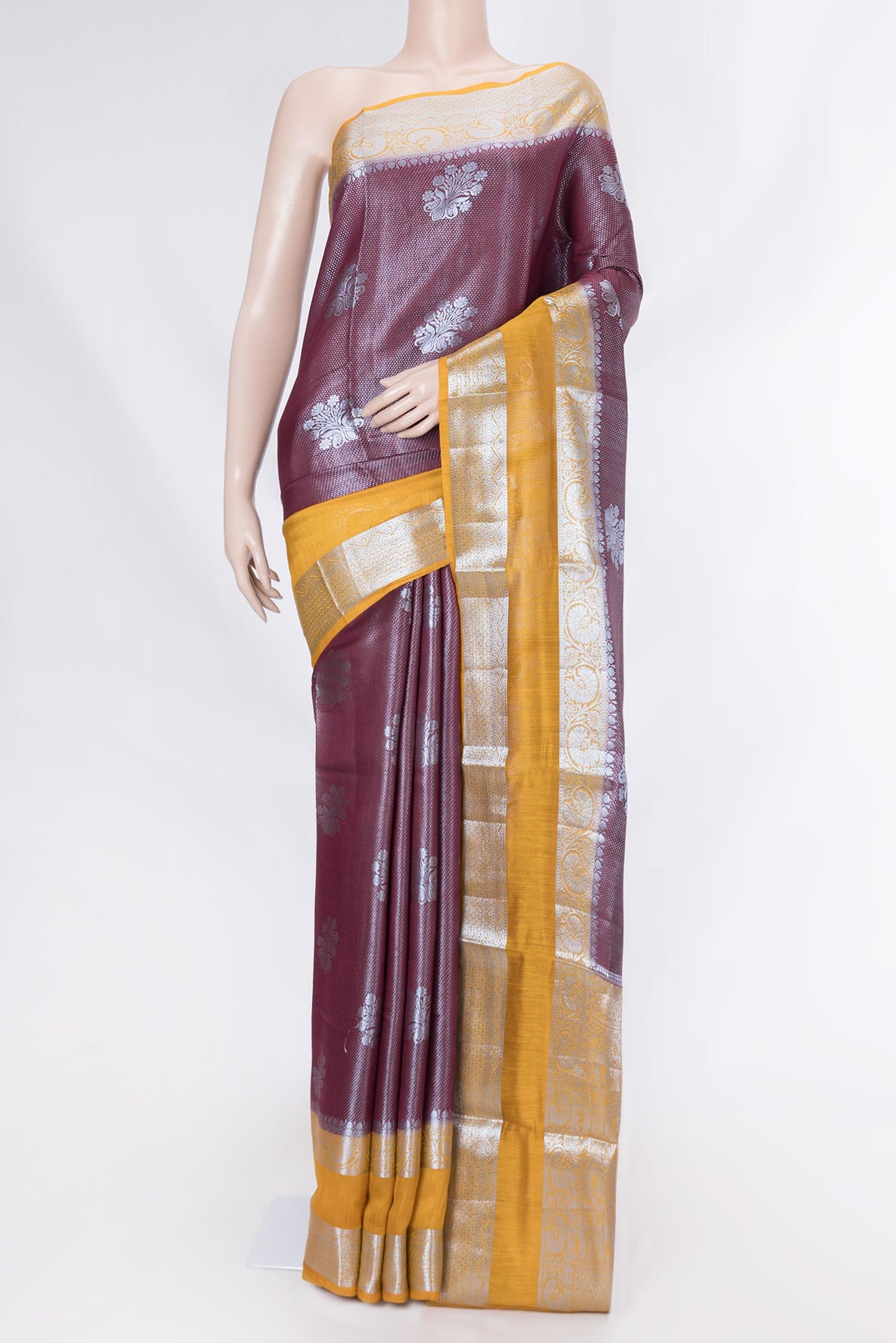 Burgundy Banarasi Raw Silk Saree with Zari Brocade on the body and Zari Border displayed on a mannequin