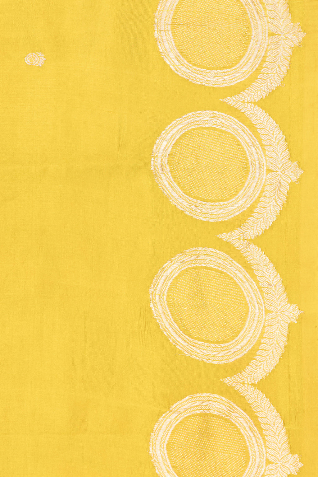 Border image of Yellow Dual Tone Tussar Silk Saree with Zari Butta on the body and Fancy Border. 