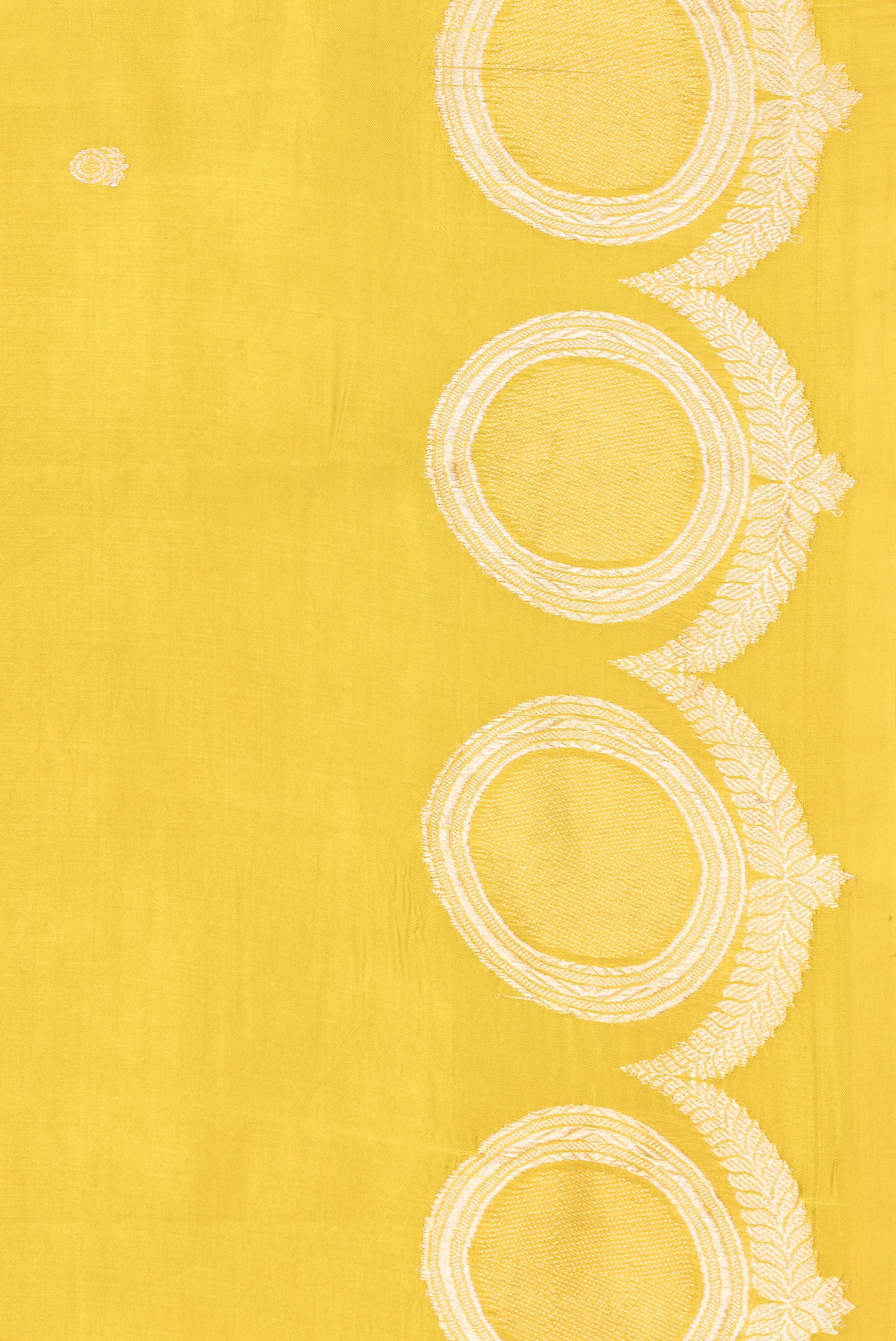 Border image of Yellow Dual Tone Tussar Silk Saree with Zari Butta on the body and Fancy Border. 