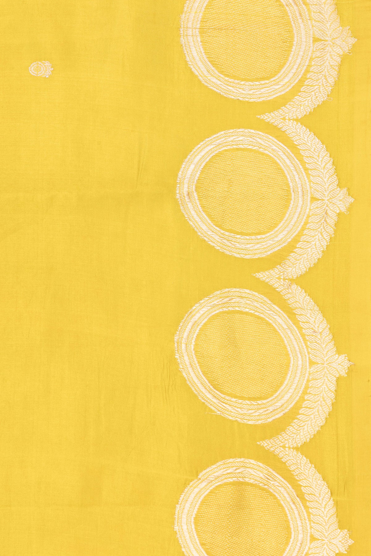 Border image of Yellow Dual Tone Tussar Silk Saree with Zari Butta on the body and Fancy Border. 