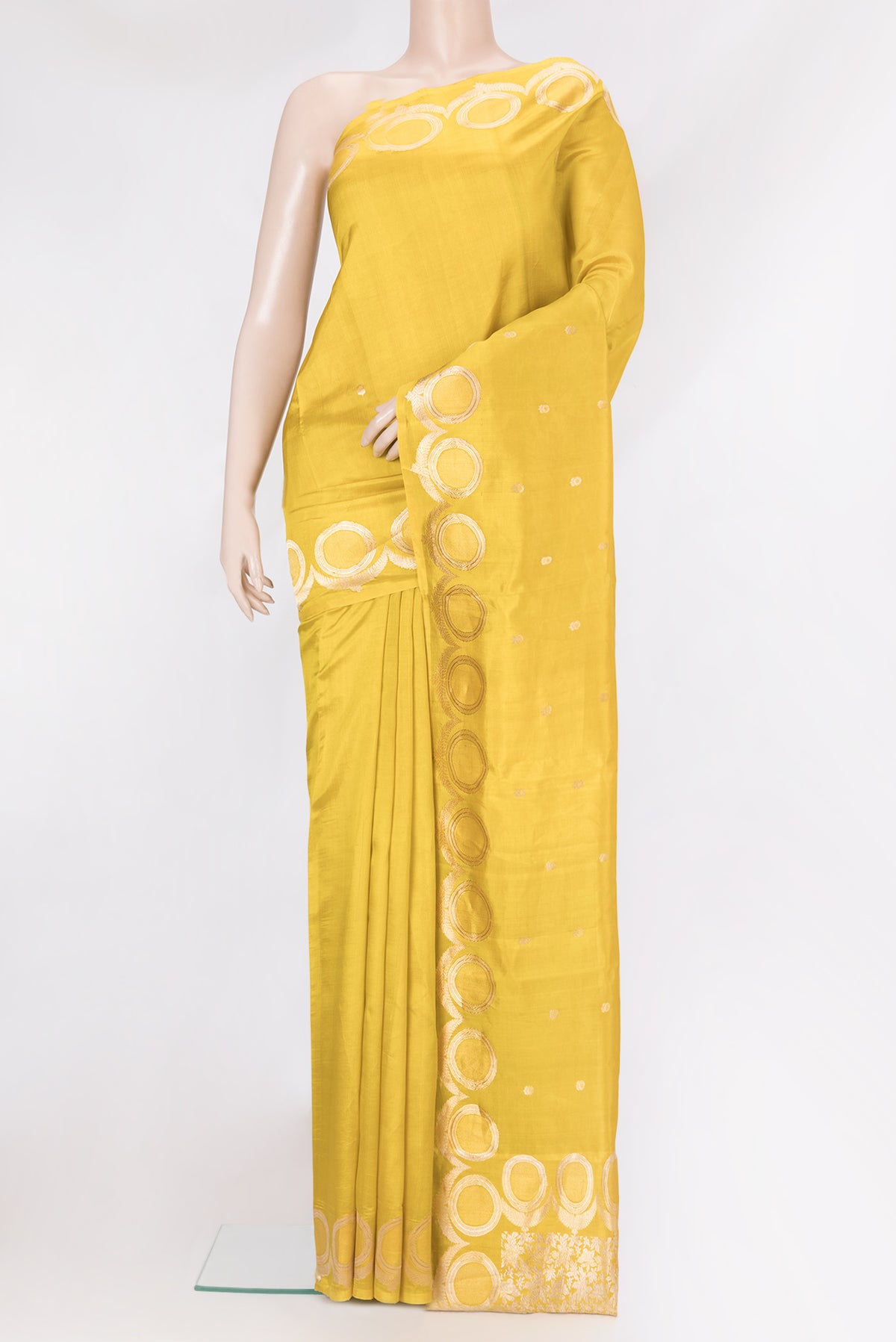 Yellow Dual Tone Tussar Silk Saree with Zari Butta on the body and Fancy Border.  displayed on a mannequin